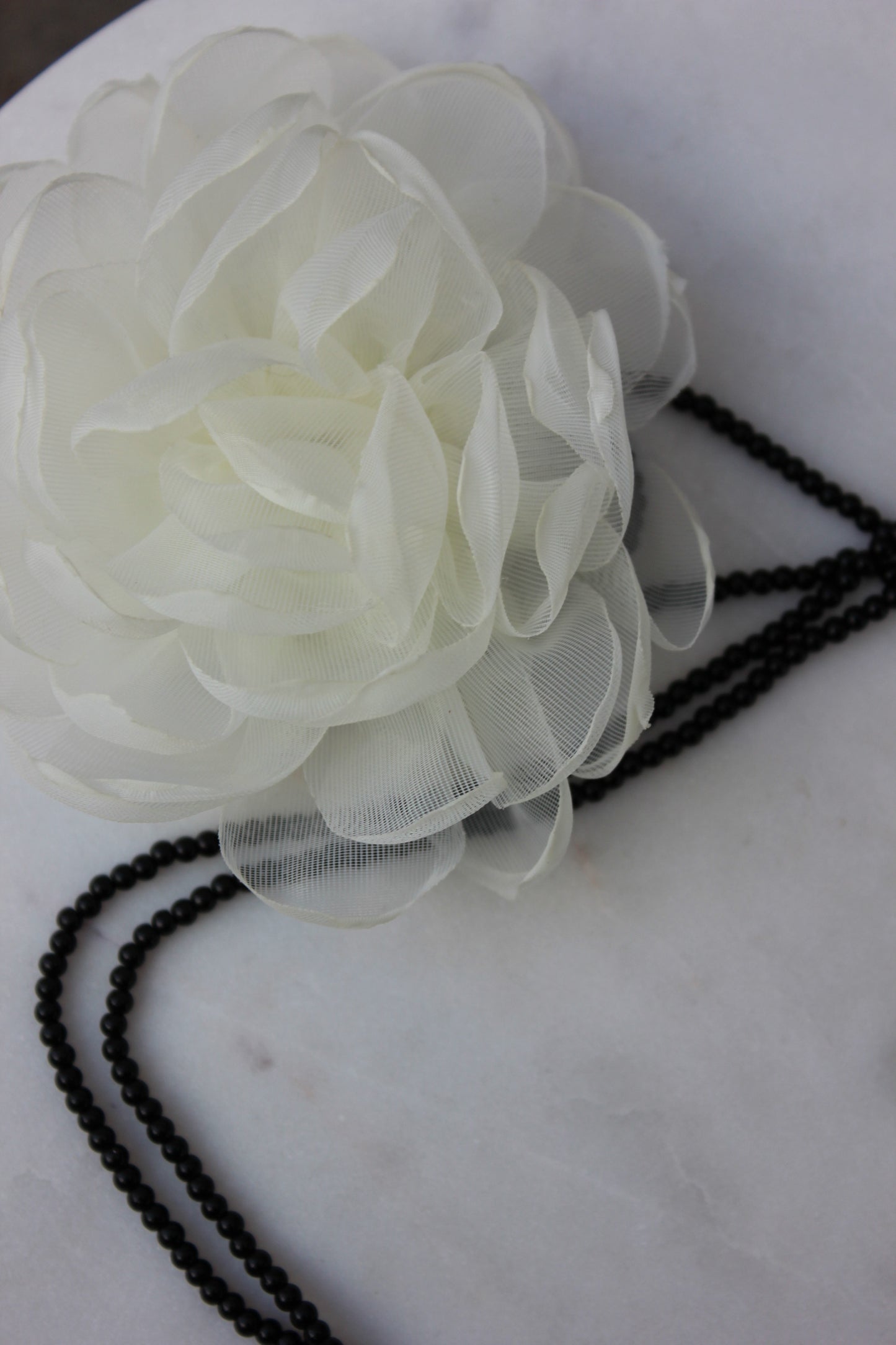 Collar flor de Sita Nevado